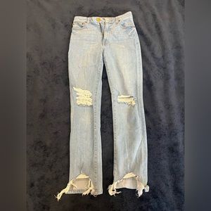 Aviator Nation light washed jeans, slightly distressed.
